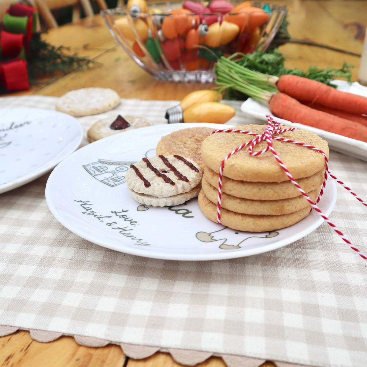 Cookiies placed and stacked on a ceramic plate. Christmas theme