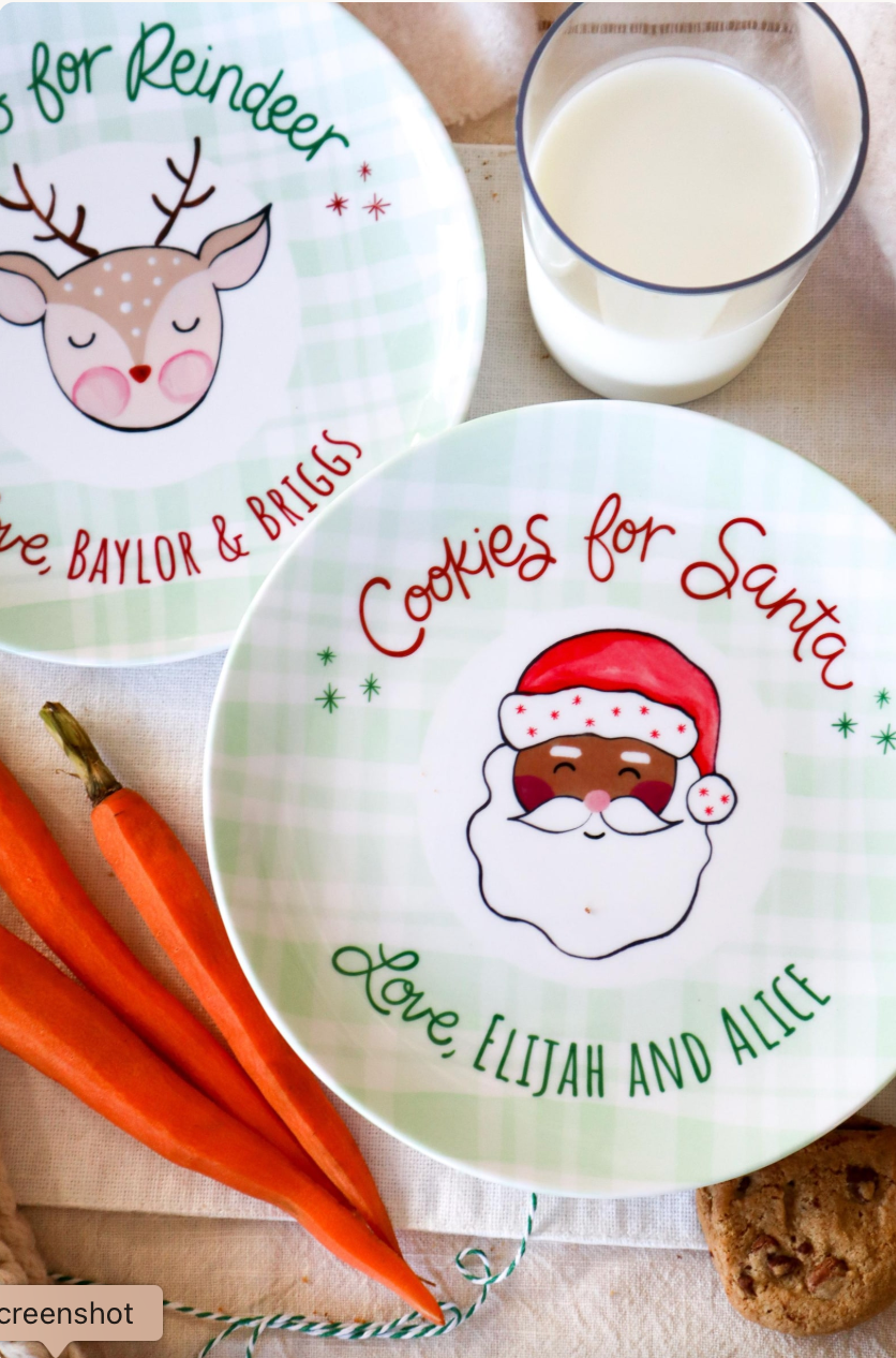 Black santa cookies plate and matching treats for reinder plate. Green plais edges. Personalized with familt names. carrots and cookies on table with ceramic plates